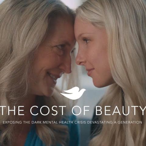 Mother and teenage daughter touch foreheads in an intimate moment from Dove’s “The Cost of Beauty” campaign.